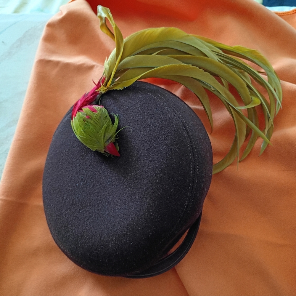 Elegant Dark Brown Half Hat with Green and Red Feather Bird Accents.